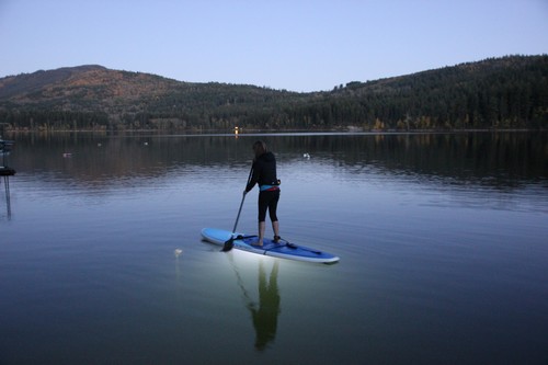 Nancy at dusk Sun Peaks Night Paddleboard tours